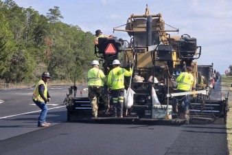Placing asphalt on US 98 (2-14-2025 photo)