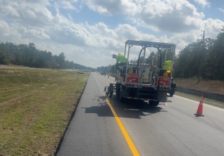 Striping the roadway (2-13-2025 photo)