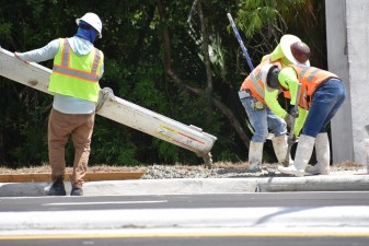 Placing concrete for sidewalk repair on the west side of Bruce B. Downs Blvd. south of SR 54 (4-11-2023 photo)