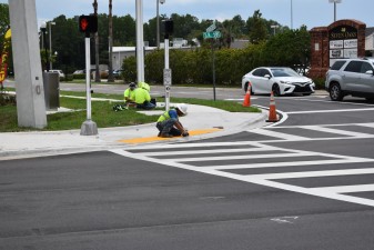 Work on final touches to the intersection improvements (5-22-2023 photo)