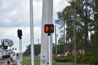 The new signalized intersection has pedestrian signals to assist people crossing the busy roadways (5-22-2023 photo)