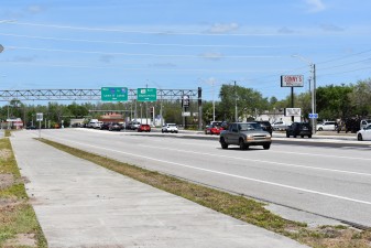 A new, raised concrete median divides northbound and southbound traffic south of SR 54 (3-31/2023 photo)