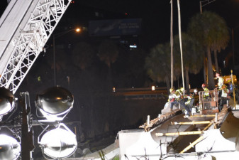 Workers install a bridge beam at SR 60 next to northbound I-275 (3/21/2020 photo)