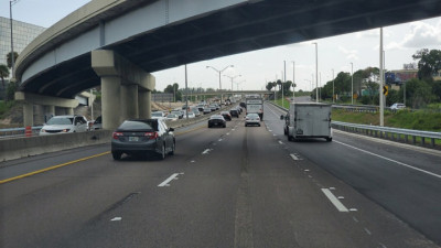 New pavement was added to extend the through-lanes and eliminate the need for drivers to merge left. (July 29, 2020 photo)