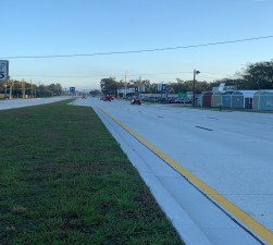 New pavement markings on the new concrete section of the roadway