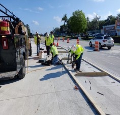 Placing forms for raised concrete separator in median of US 41 (May 2022 photo)