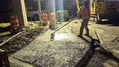Newly poured concrete curb on SR 60 west of Parson Road (Photo June 2026)
