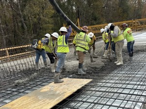 Placing concrete for the bridge deck over the Hillsborough River (12-18-2025 photo)