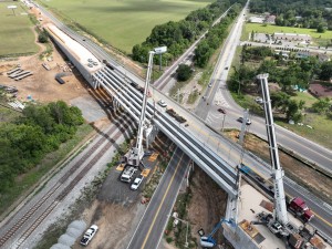 Setting the third concrete I-beam for a new US 98 bridge over Old Lakeland Highway (5-13-2026 photo)