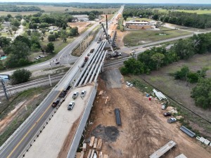 Looking north at bridge beam placement over Old Lakeland Highway (5-13-2026 photo)