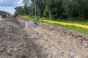 Installing storm drainage pipe and structures north of CR 54 (9-3-2025 photo)