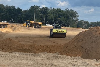 Placing fill along Clinton Avenue for the new roadway alignment (8-19-2025 photo)