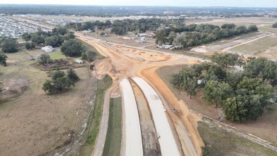 Looking northwest at construction of the new US 98 alignment and roundabout at Clinton Avenue (12-3-2025 photo)