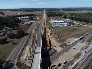 Looking north over US 98 at MSE wall construction (12-3-2025 photo)