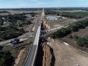 Looking north over US 98 at completed bridge piling (12-3-2025 photo)