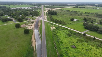Looking northwest in the Townsend Road area where US 98 is being realigned to go north to Clinton Avenue (6-29-2025 photo)