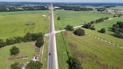 Looking northwest over US 98 the Janmar Road intersection (8-30-2025 photo)