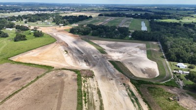 Looking north over construction of the new US 98 alignment south of Clinton Avenue (8-30-2025 photo)