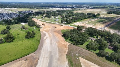 Looking northwest over construction of the new US 98 where it will tie into Clinton Avenue (8-30-2025 photo)