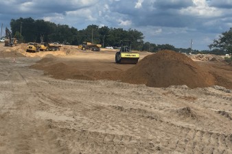 Placing fill along Clinton Avenue for the new roadway alignment (8-19-2025 photo)