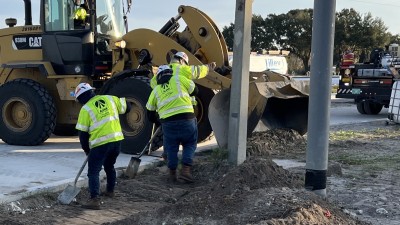 Crews performing grade work by hand at the intersection of SR 60 and SR 39 in Plant City (January 2026 photo)