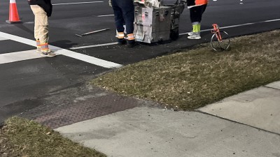 Crews adding roadway marking to travel lanes on US 301 just north of Gibsonton Drive in Riverview (February 2026 photo)