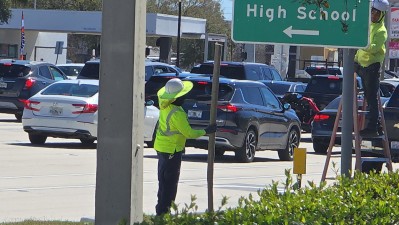 Crews installing roadway signage to the intersection of 301 and Gibsonton Drive in Riverview (February 2026 photo)