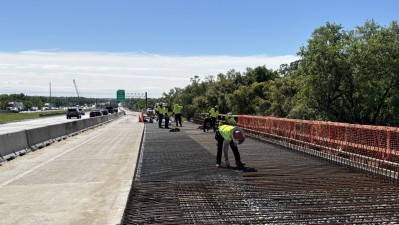 Image of I-75 bridge widening showing forming crews over Harney Road (Photo February 2026)