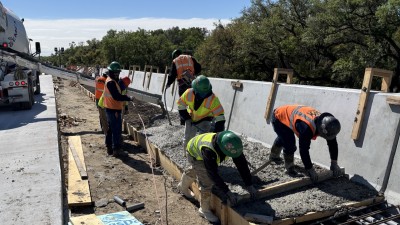 Image of I-75 bridge widening showing concrete deck pour work over Harney Road (Photo February 2026)