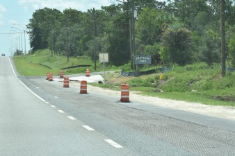 Work is being done in the turn lane before milling and resurfacing of all lanes (7-21-2025 photo)