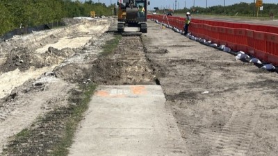 Crews grade for the pedestrian trail along the west side of 4th Street N (April 2026 photo)
