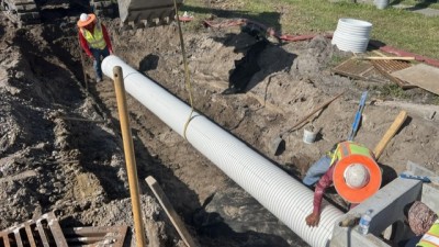Crews place a drainage structure (April 2026 photo)