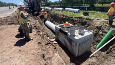Crews place drainage structure (April 2026 photo)