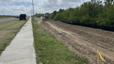 Looking south on 4th Street North as crews perform base work for the shared use path (March 2026 photo)