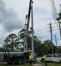 Placing a pole into position (8/17/2022 photo)