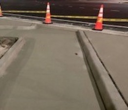 New concrete for pedestrian refuge island on the northeast corner of US-19 / Marine Pkwy. (photo 3/23/2021)