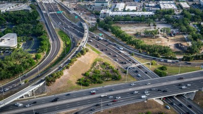 Image of northbound and southbound I-275 travel lanes showing ramp to SR 60 (Memorial Hwy) and Tampa International Airport (Photo May 2026)