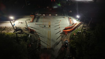 Looking south over Mondon Hill Road at new concrete roadway at the US 98 / SR 50 intersection (9-21-2026 photo)
