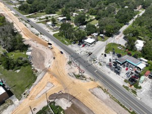 Looking southwest at construction of a roundabout at US 301 / SR 575 / Trilby Road (6-17-2026 photo)