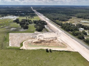 Looking southwest at storm water pond construction on the east side of US 301, south of SR 50 (10-15-2025 photo)