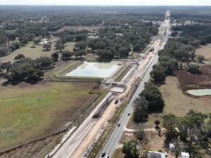 Looking south over US 301 at roadway widening and storm water pond work north of Trilby Road (1-13-2026 photo)