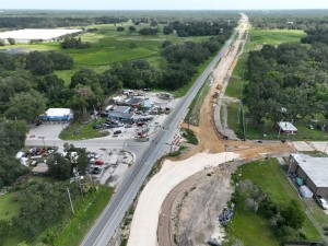Looking north over US 301 at roundabout construction at Trilby Road / CR 575 (7-15-2026 photo)