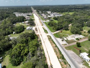 Looking southwest over US 301 at widening work south of CR 575 / Trilby Road (7-15-2026 photo)