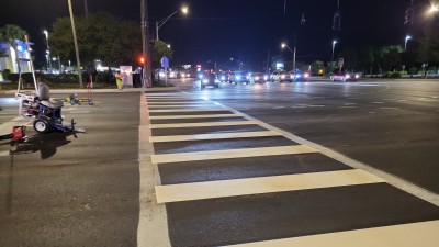 Crosswalk pavement markings at intersection of East Bay Drive and Belcher Road N (April 2026 photo)