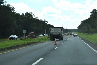 Grass is graded away from the travel lane (7-21-2025 photo)