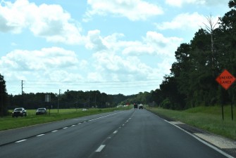 Sign of the times: Repaving is underway, resulting in uneven height between the turn lane and travel lanes (7-21-2025 photo)