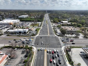 Looking east over SR 54 at the Rowan Rd / Seven Springs Blvd intersection (3-7-2026 photo)