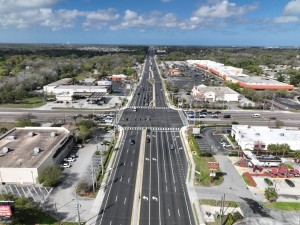 Looking west over SR 54 at the Seven Springs Blvd / Rowan Rd intersection (3-7-2026 photo)
