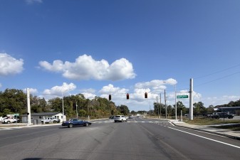Cars turn from Gospel Island Road onto eastbound SR 44 at the newly signalized intersection (11/24/2025)