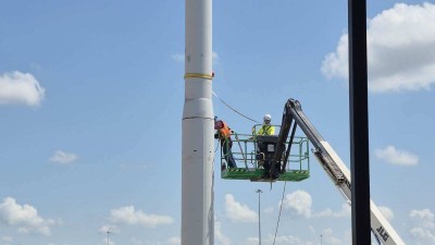 Image of flagpole installation work at future I-4 truck parking facility in Hillsborough County (Photo July 2026)